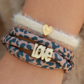 Ensemble de bracelets léopard duveteux beige